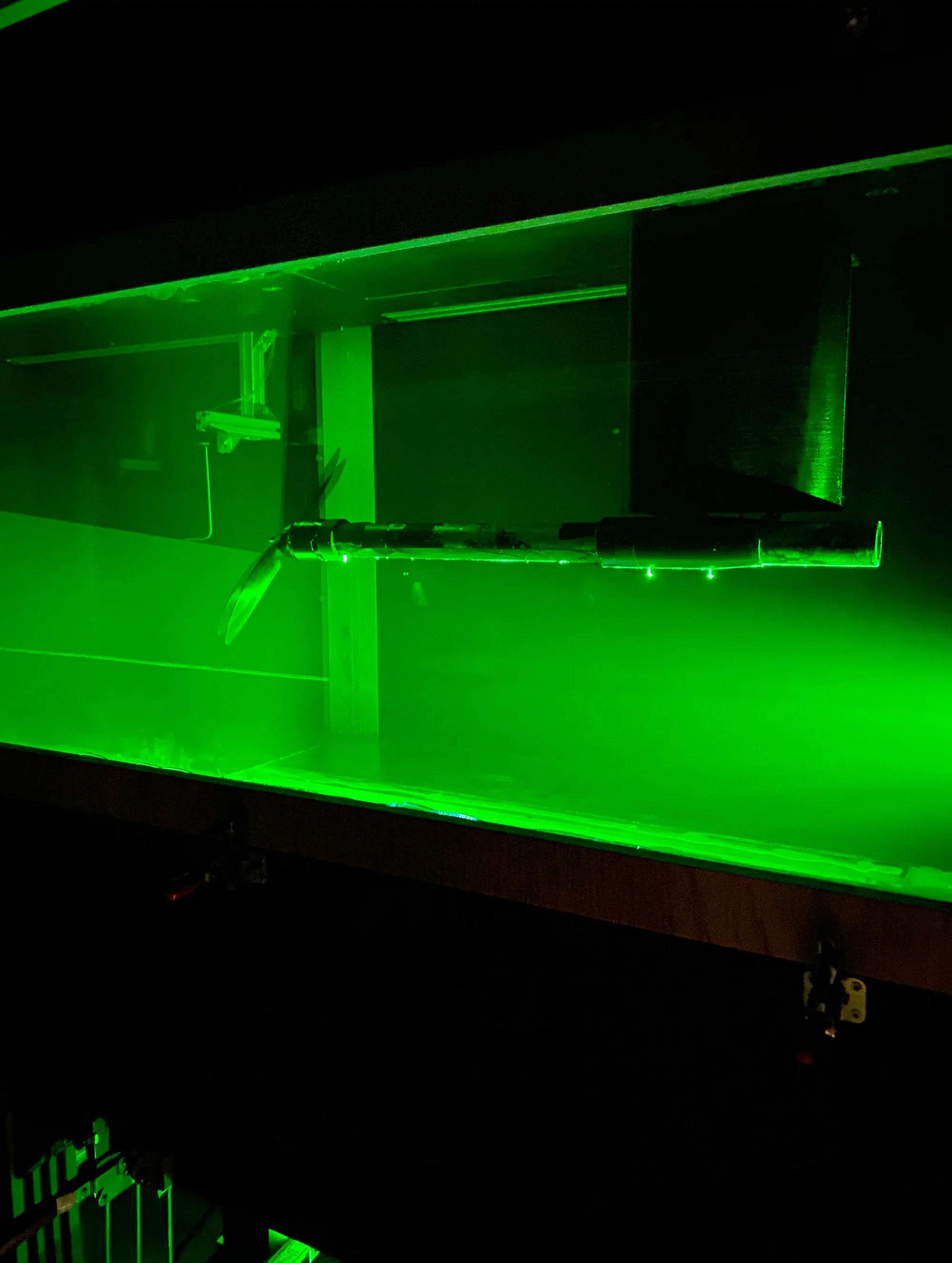 A green laser sheet in a transparent test section